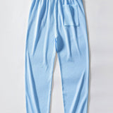V-Neck Ribbed Polo with Short Sleeves & Straight Leg Ribbed Trousers