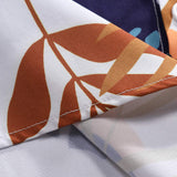 Vibrant Leaf Pattern Button-Up Shirt with Matching Swim Shorts